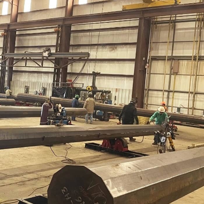 SI Utility manufacturing facility with workers